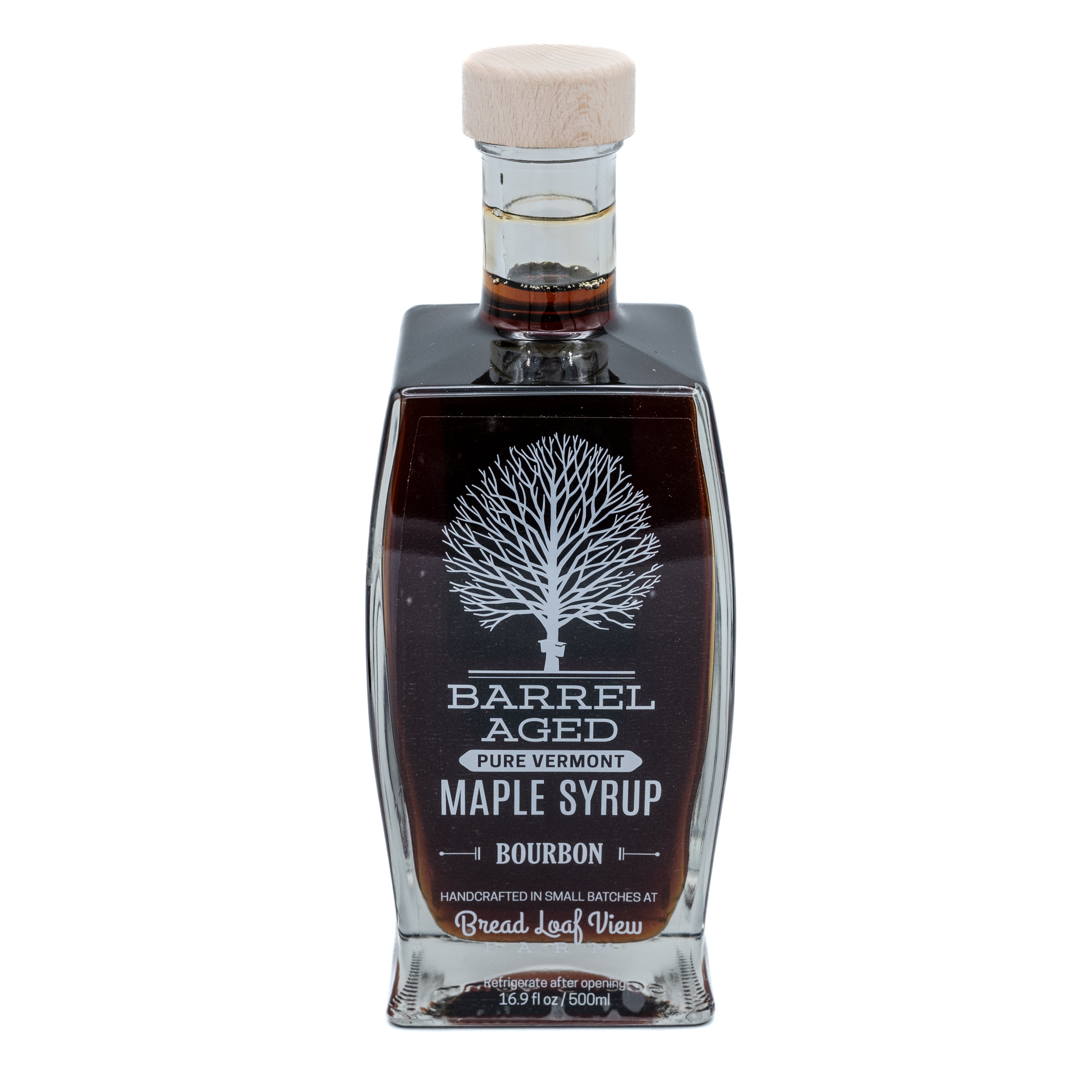 Bottle of barrel aged vermont maple syrup by bread loaf farm