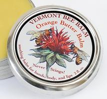 vermont bee balm orange butter balm open tin