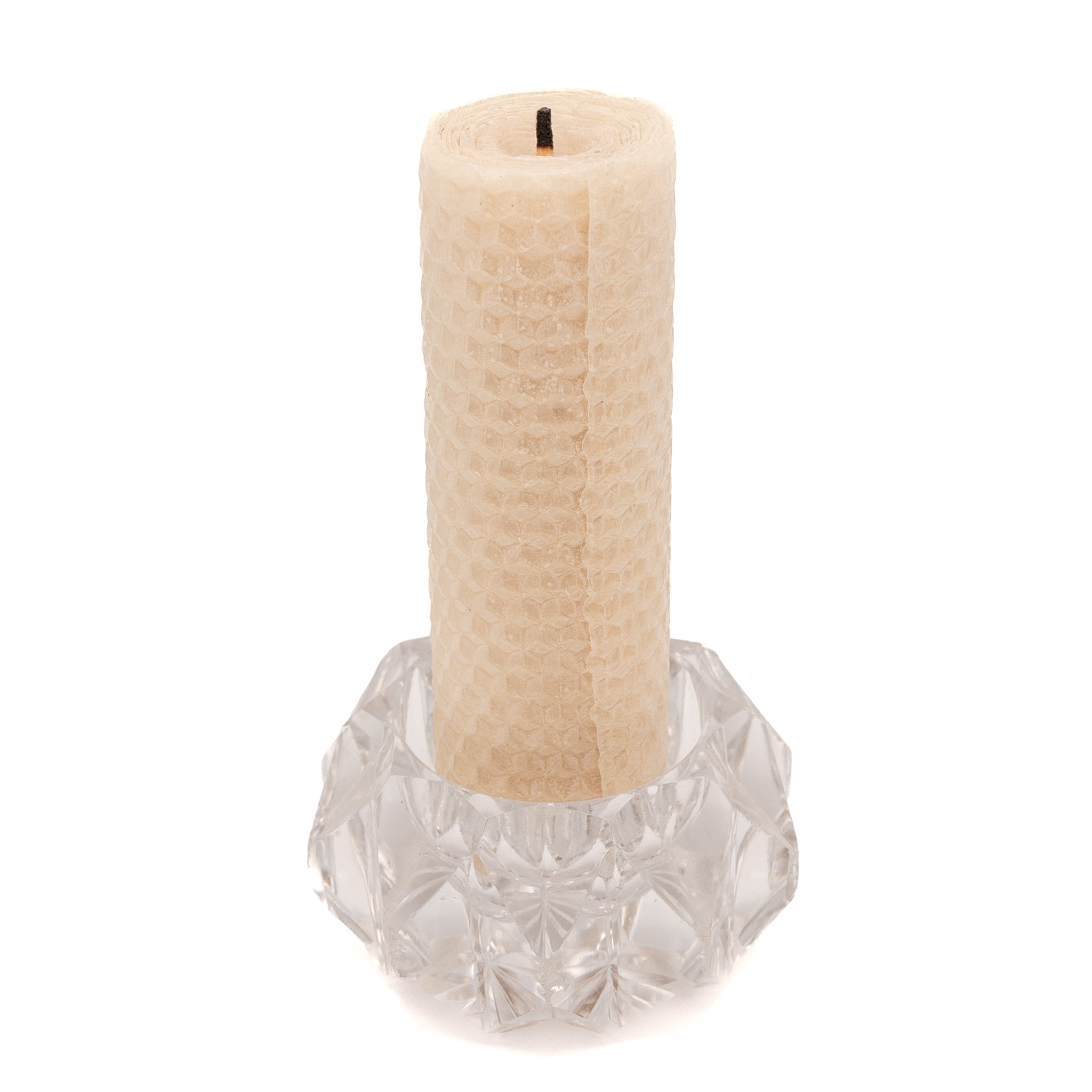 rolled beeswax candle in glass votive holder